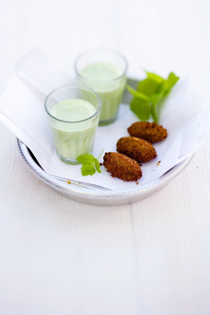 Avocado and elderflower lassi with coriander and spicy falafel