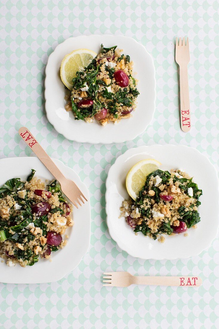 Quinoa salad with kale, red grapes and feta cheese (seen from above)