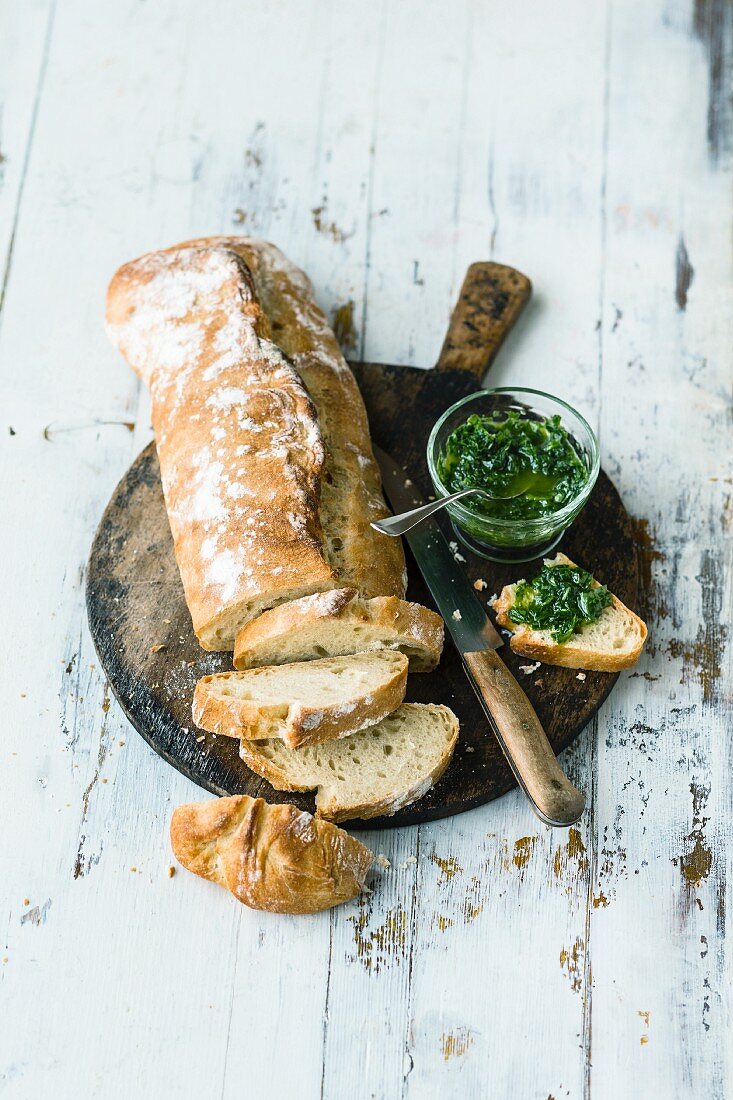 Homemade ciabatta with herb pesto