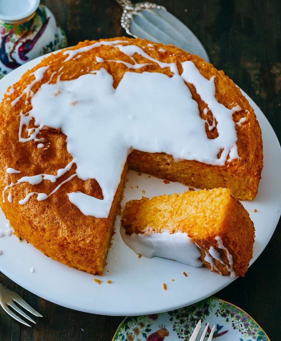 Gluten-free carrot cake topped with icing