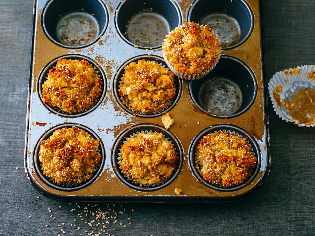 Apple and sesame seed muffins with grated coconut