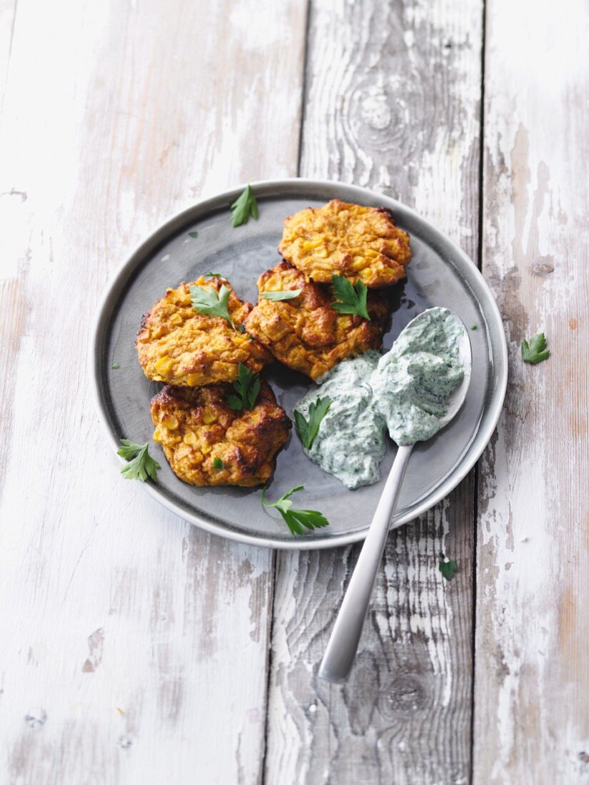 Latkes made from oven-roasted sweet potatoes with a spinach dip