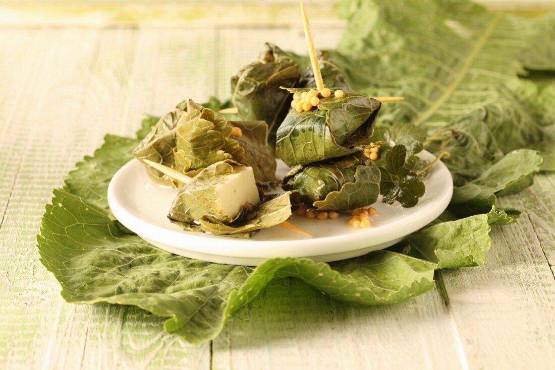 Diced cheese on a horseradish leaf