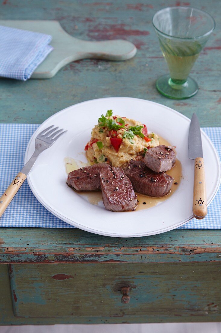 Flash-fried lamb medallions with chickpea purée