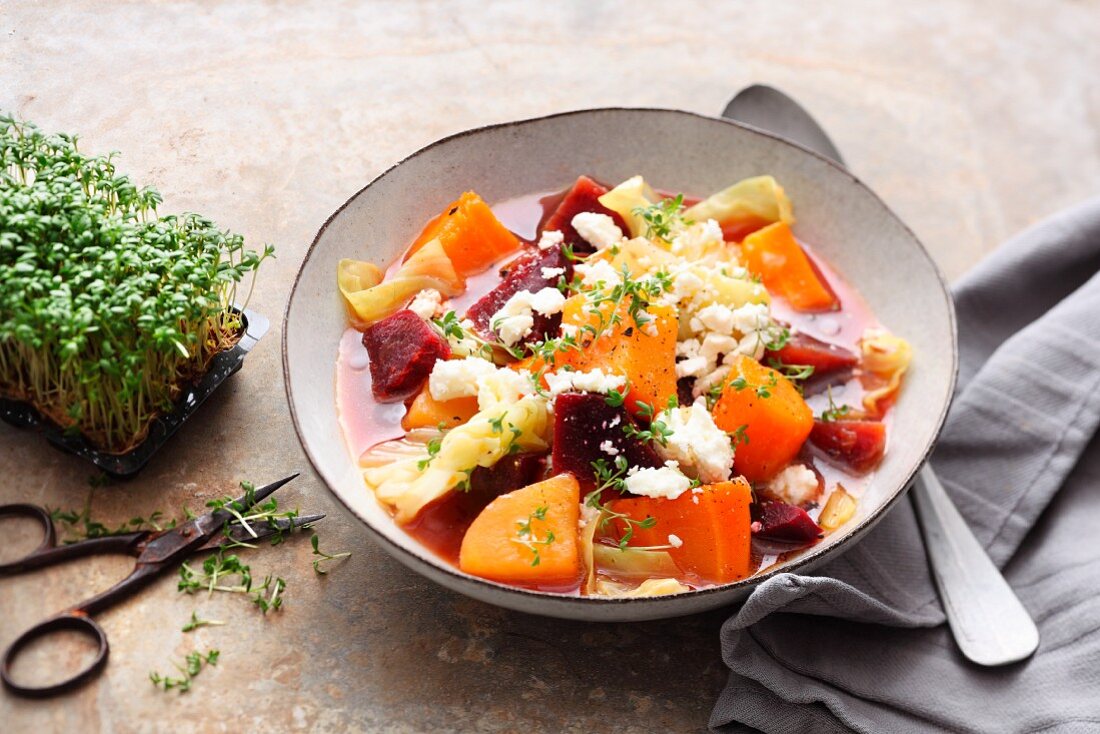 Beetroot stew with potatoes, carrots and feta cheese