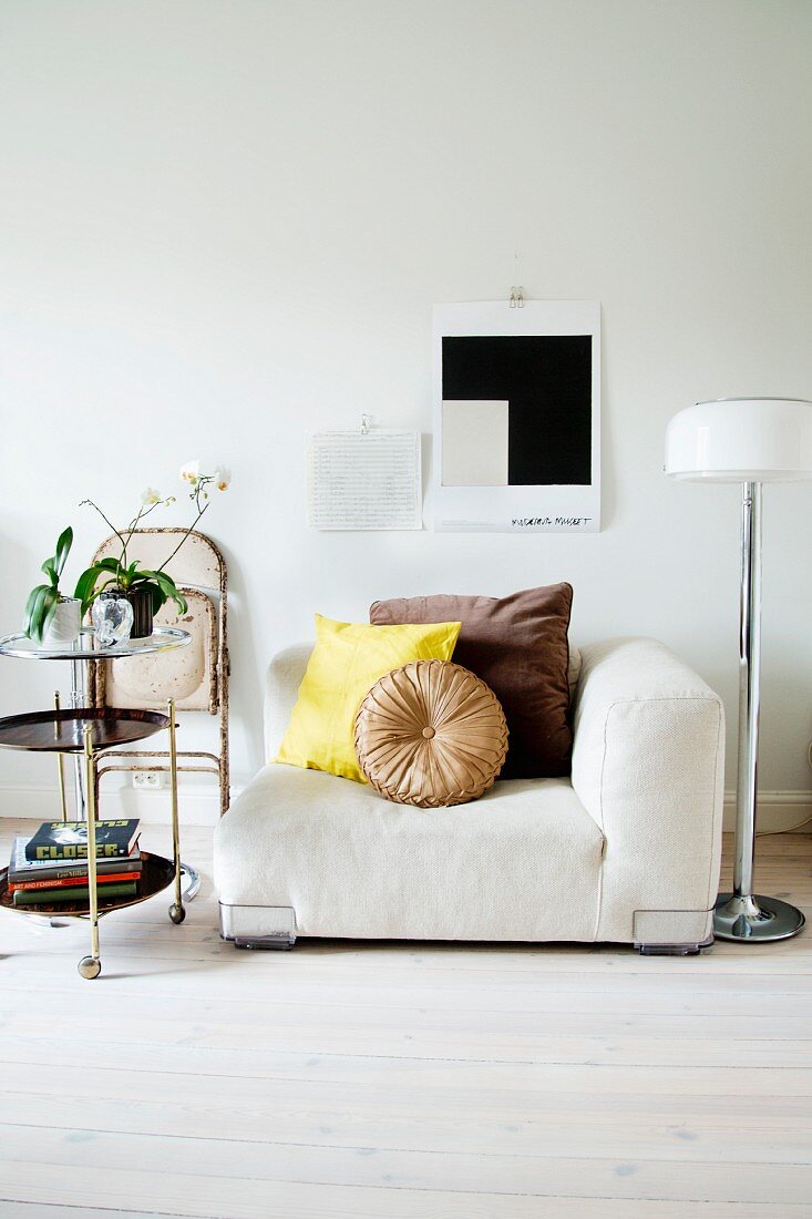 Corner armchair, retro hostess trolley and standard lamp