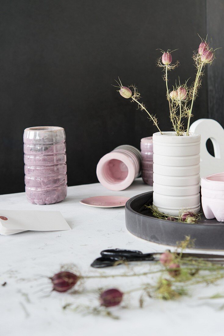 Plastic bottles used as moulds for homemade concrete vases
