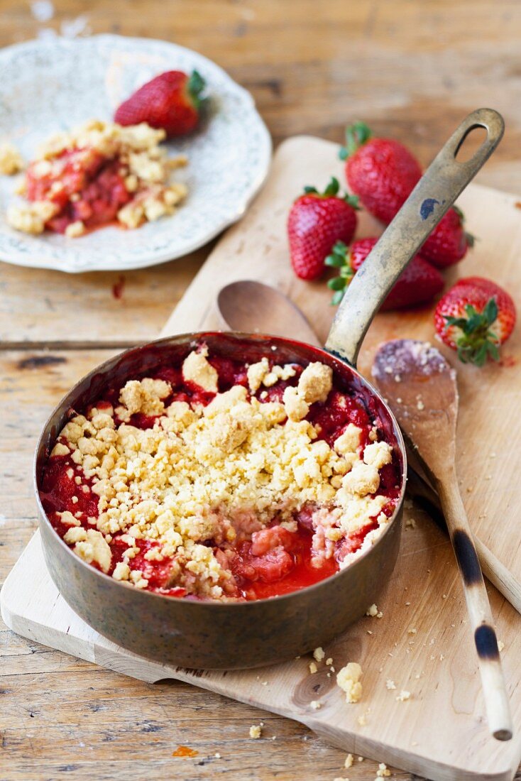 Strawberry and rhubarb crumble in a saucepan