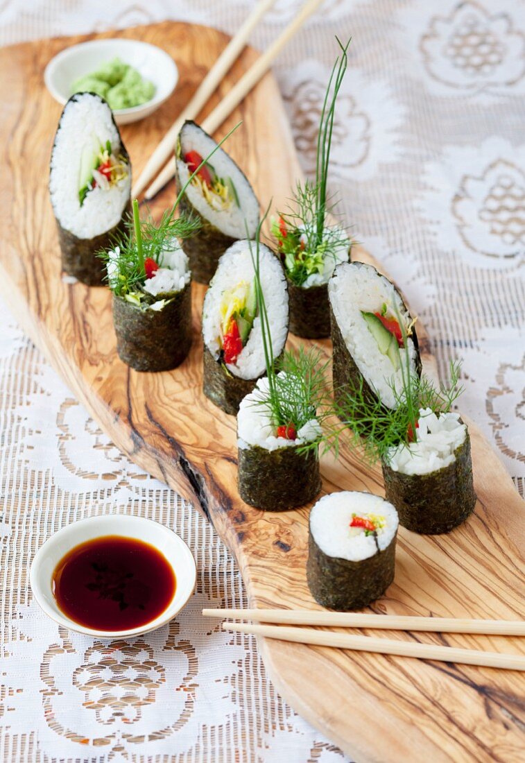 Maki sushi with vegetables and herbs