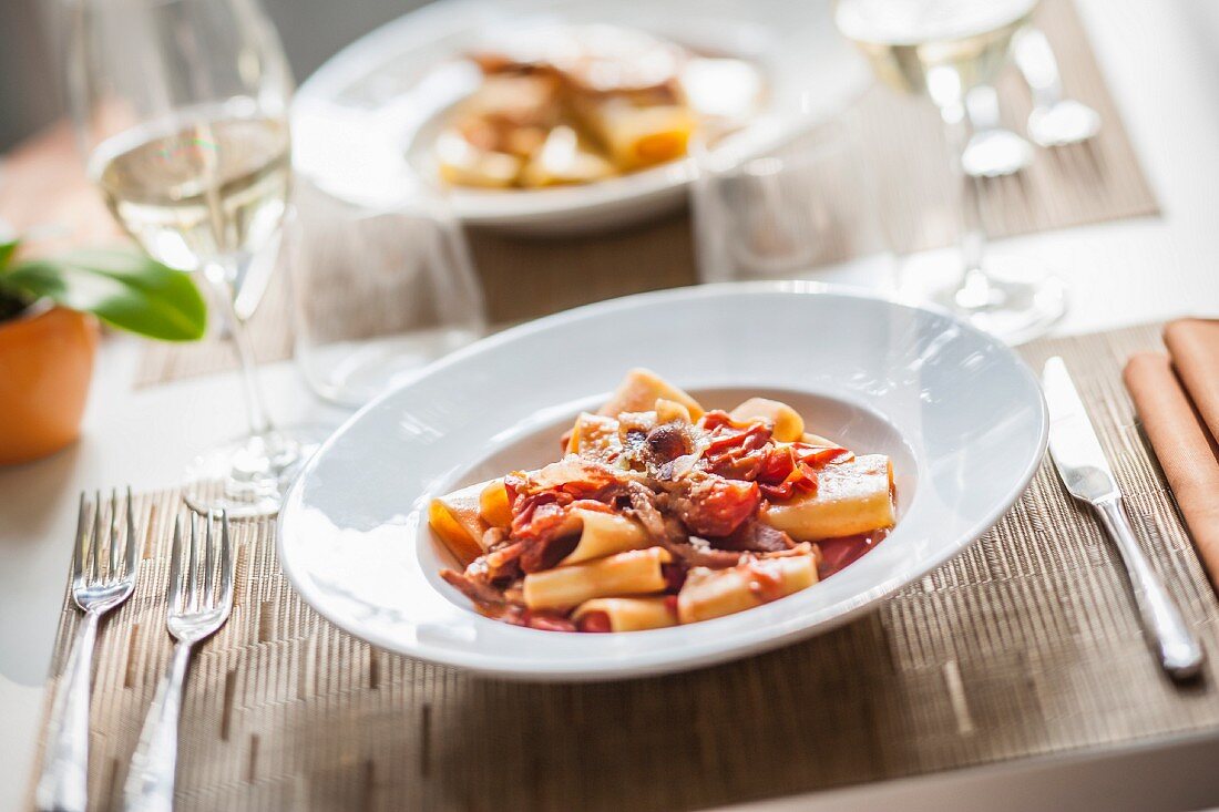 Paccheri all'amatriciana (pasta with bacon and chillis, Italy)