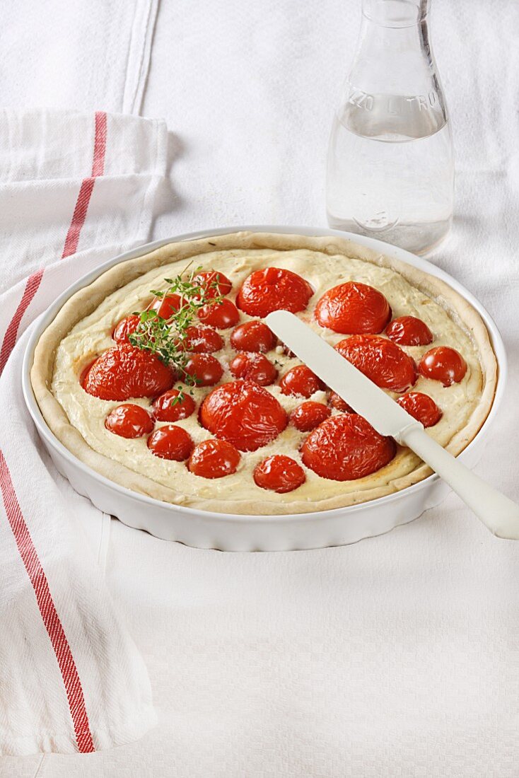 Ricotta cake with tomato and thyme