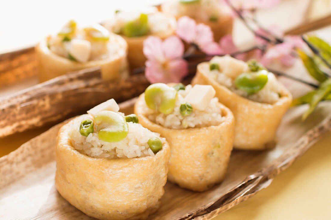 Inari with sticky rice, beans and peas (Japan)