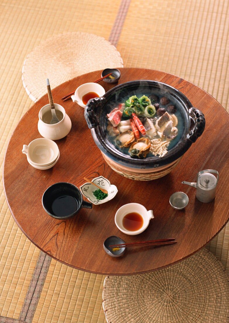 A dining table laid with Yosenabo (Japanese stew prepared at the table)