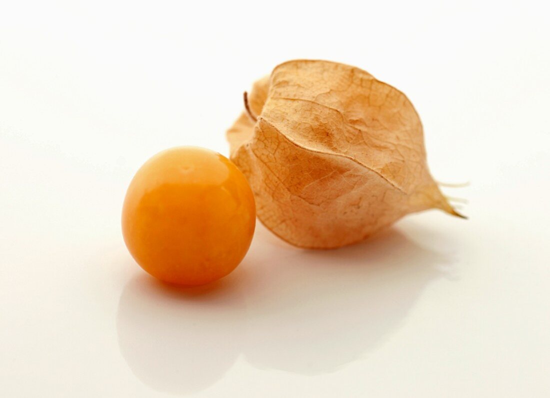 Cape gooseberries on a white surface