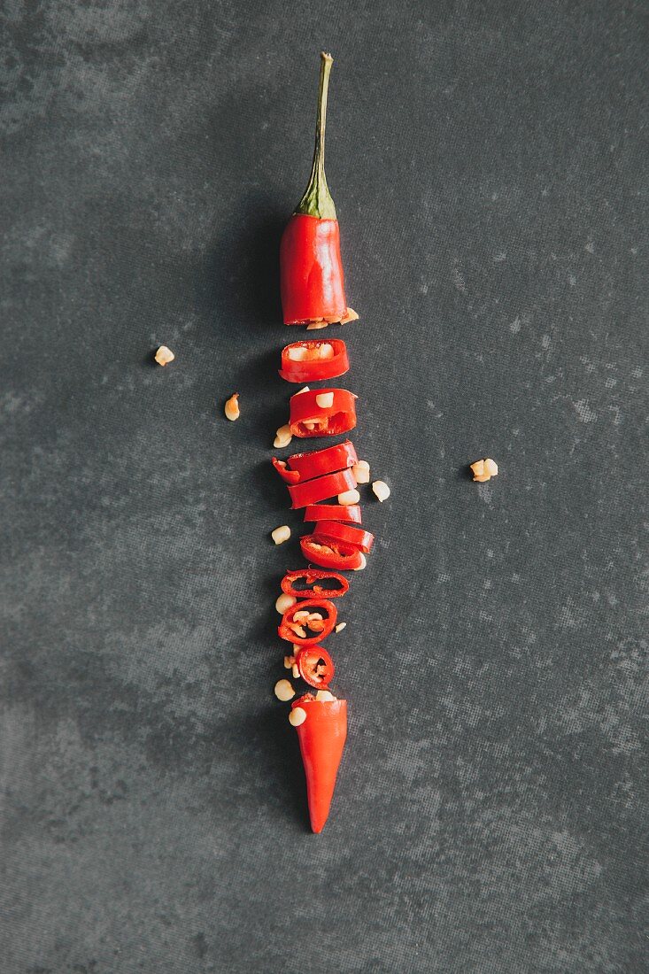 A sliced red chilli pepper (seen from above)
