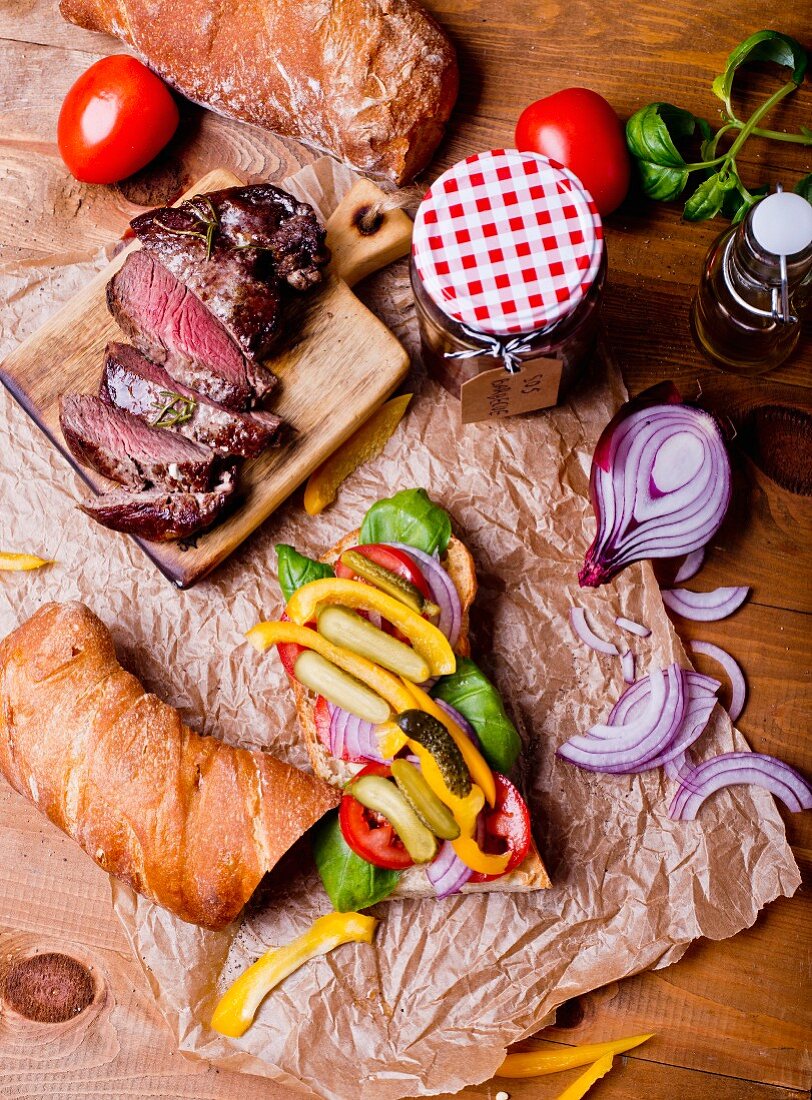A steak sandwich with ingredients