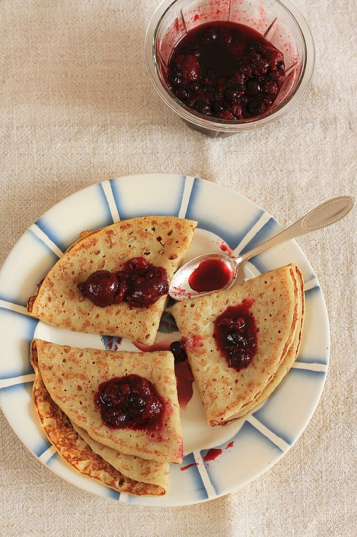Pancakes with red berry jam (seen from above)