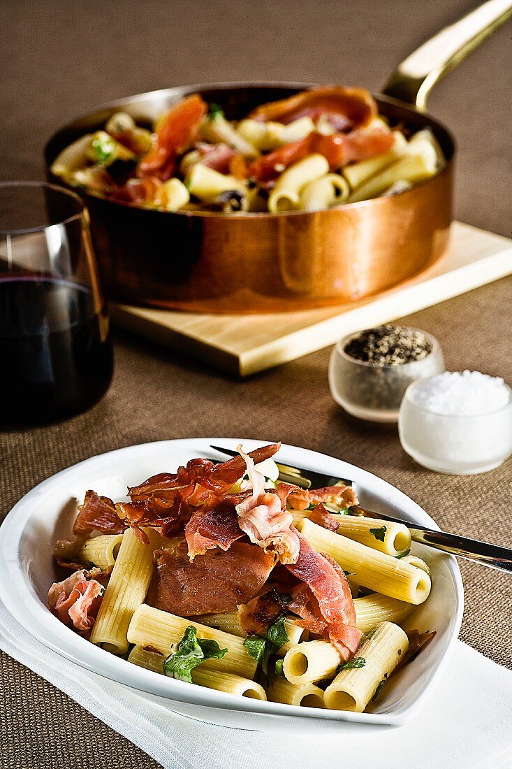 Pasta served with Prosciutto and herbs