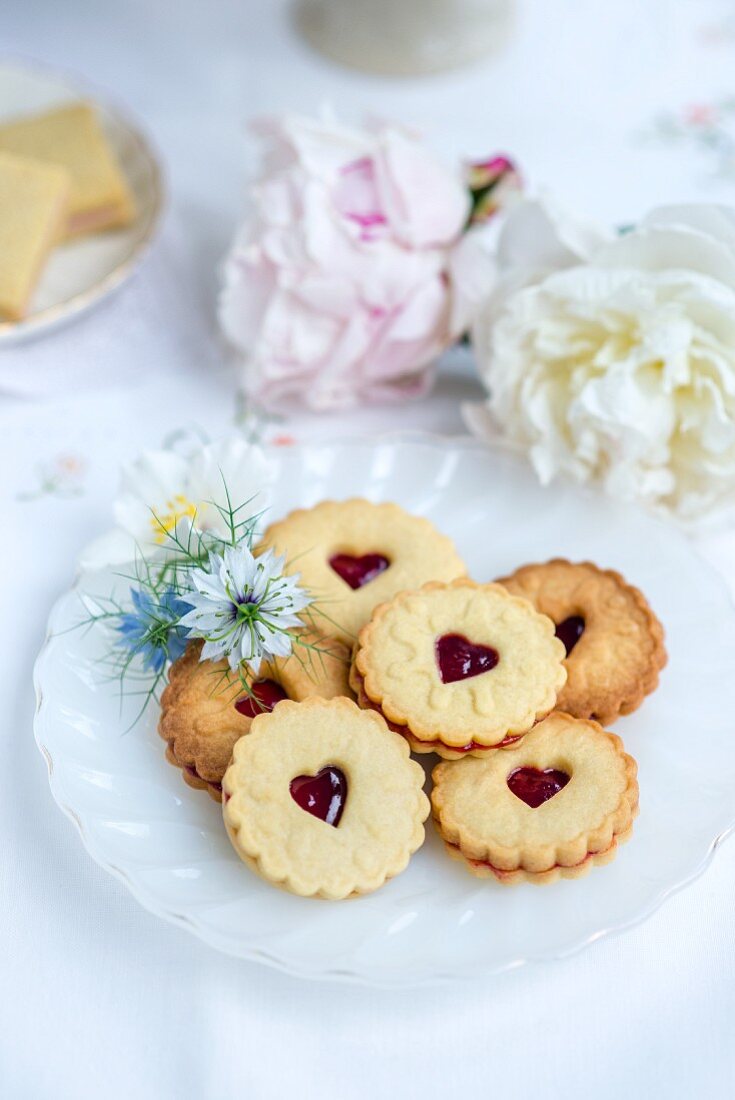 Jam sandwich biscuits served with tea