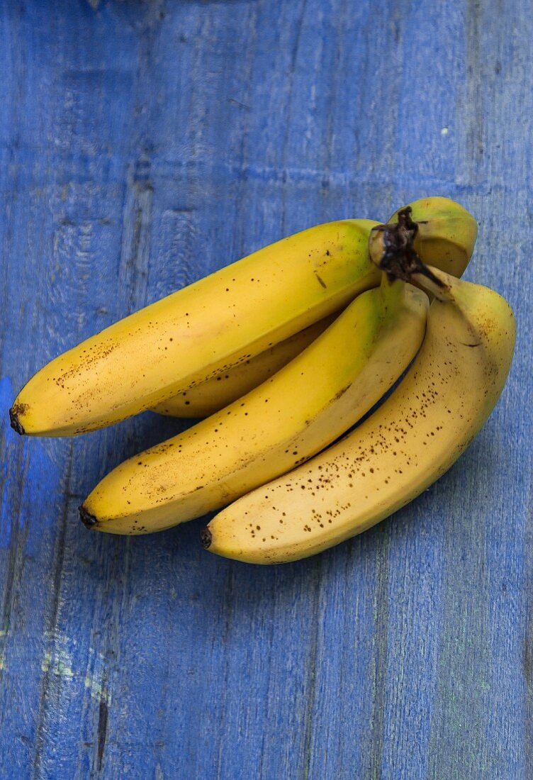 Bananas on a blue surface