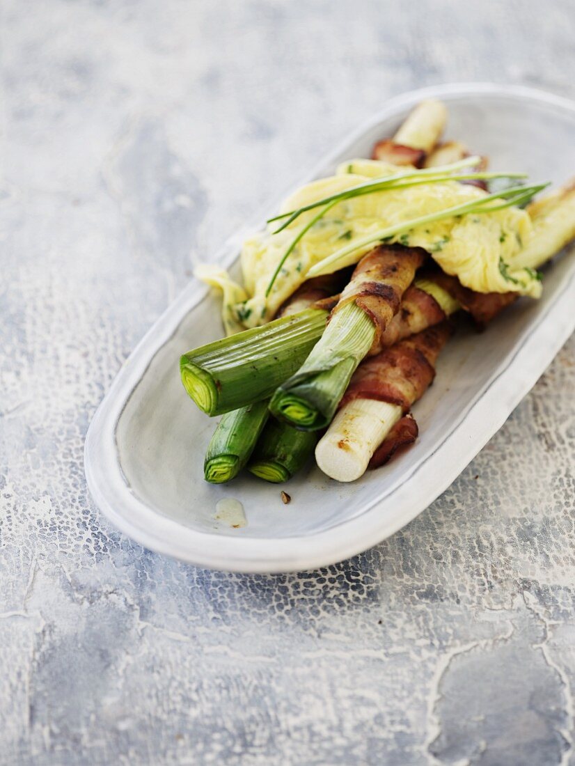 Leek wrapped in bacon with herb scrambled egg