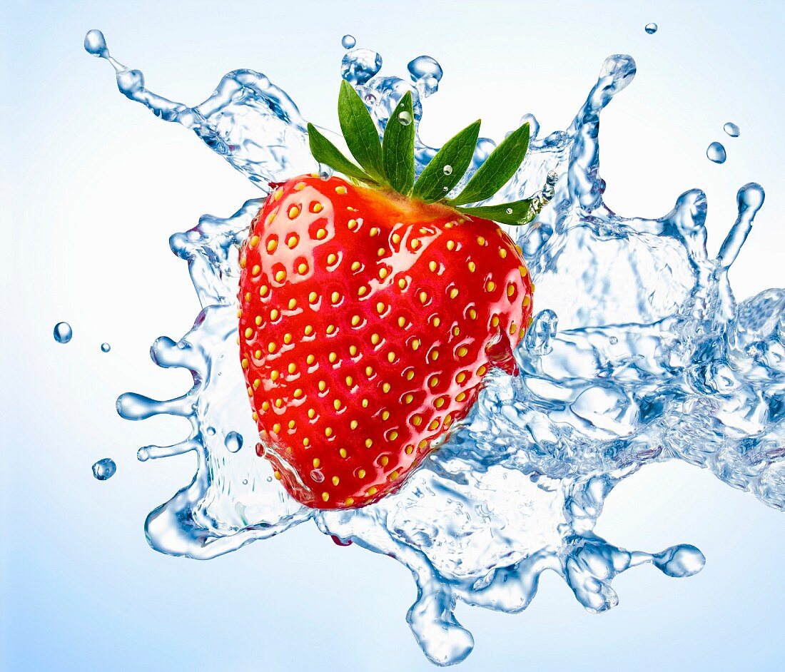 A strawberry with a splash of water (close-up)