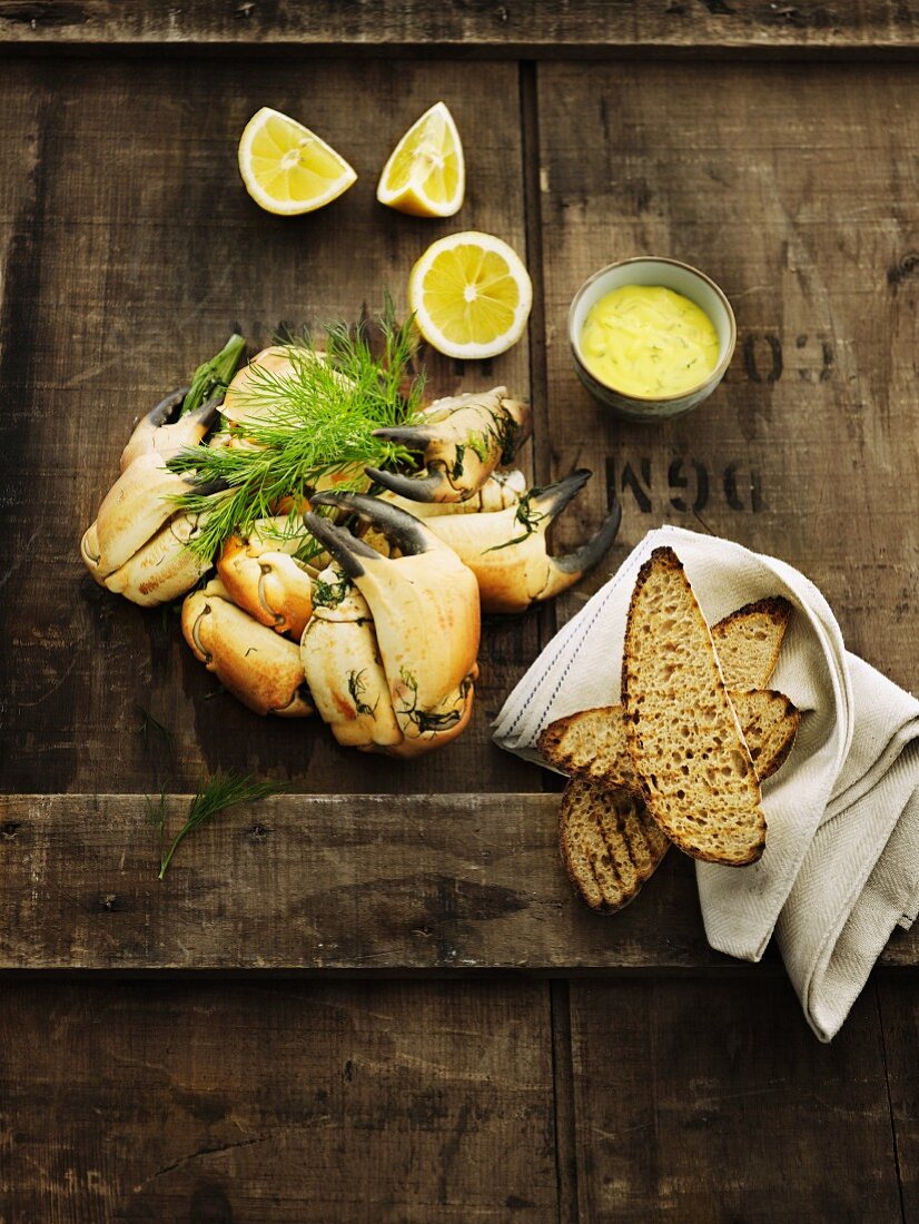 Crab claws with grilled bread and a lemon dip