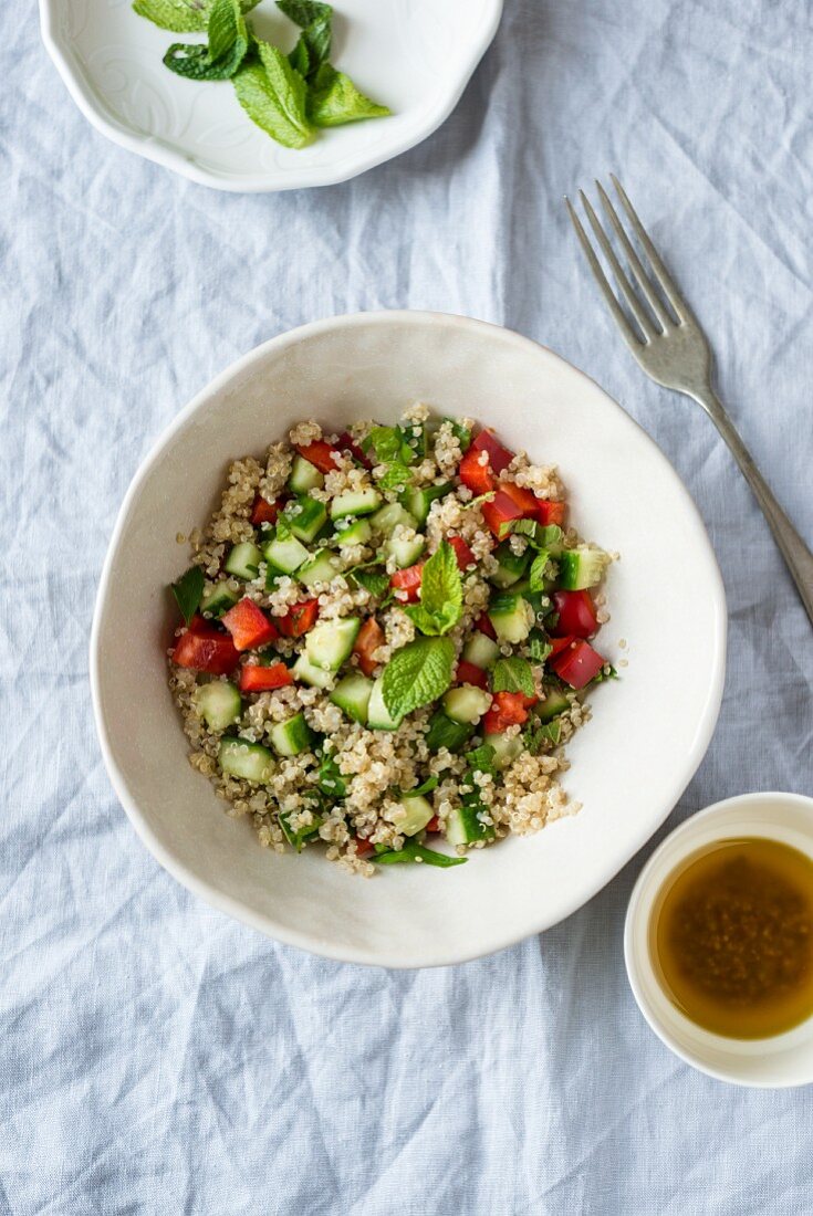 Quinoa salad with cucumber, tomatoes and mint