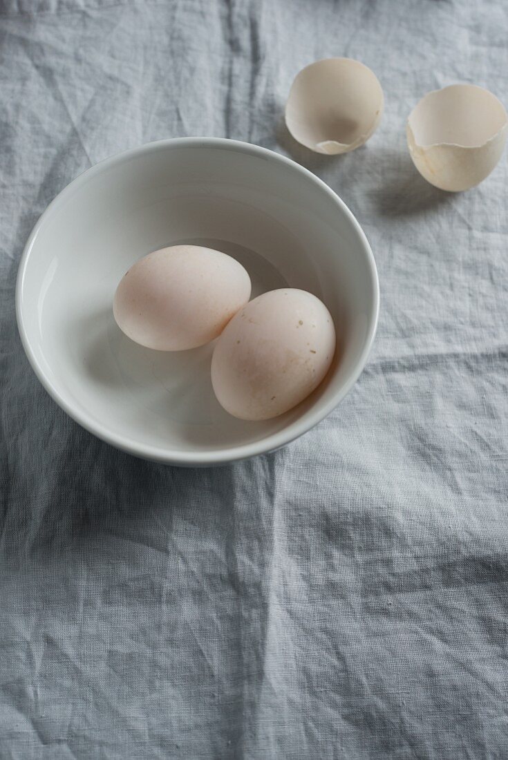 Two duck eggs in a bowl