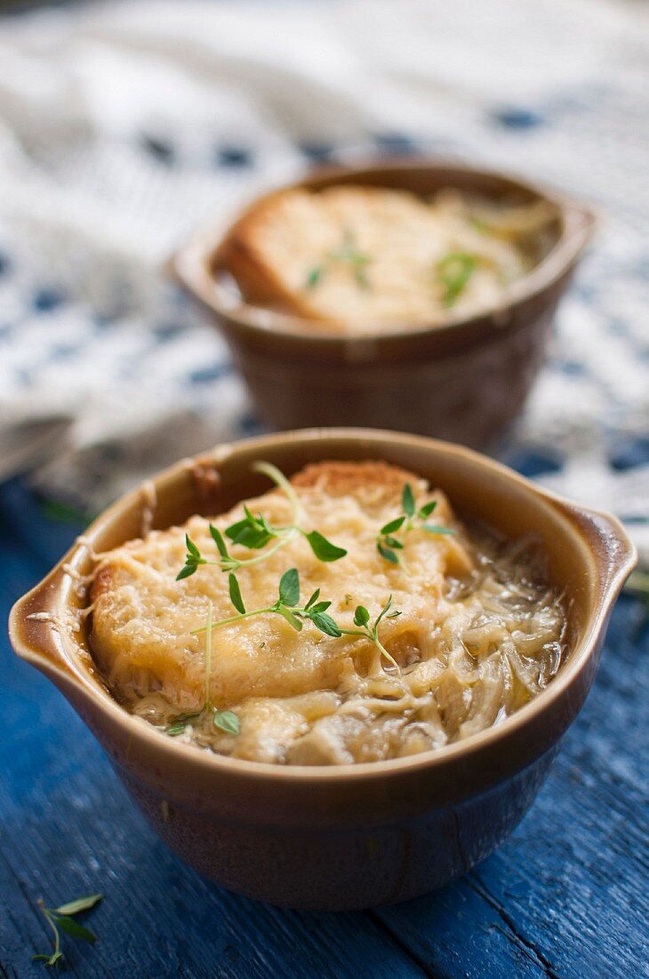 French onion soup with toast, Gruyere cheese and fresh thyme