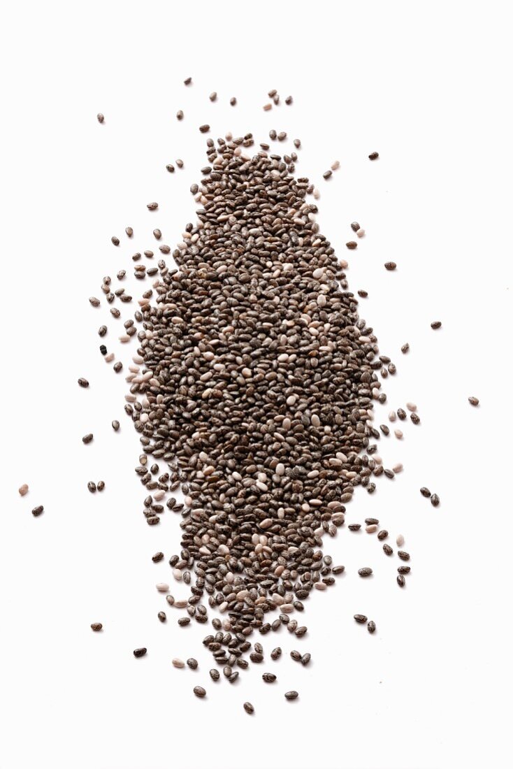 Chia seeds on a white surface