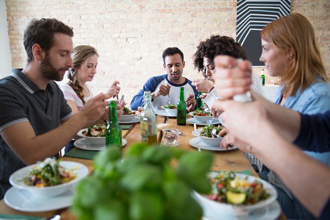 Friends eating together