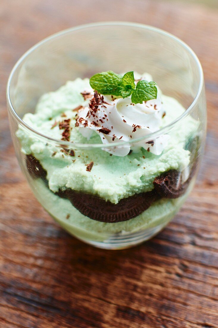 A vegan layered dessert with mint parfait made from tofu and chocolate biscuits