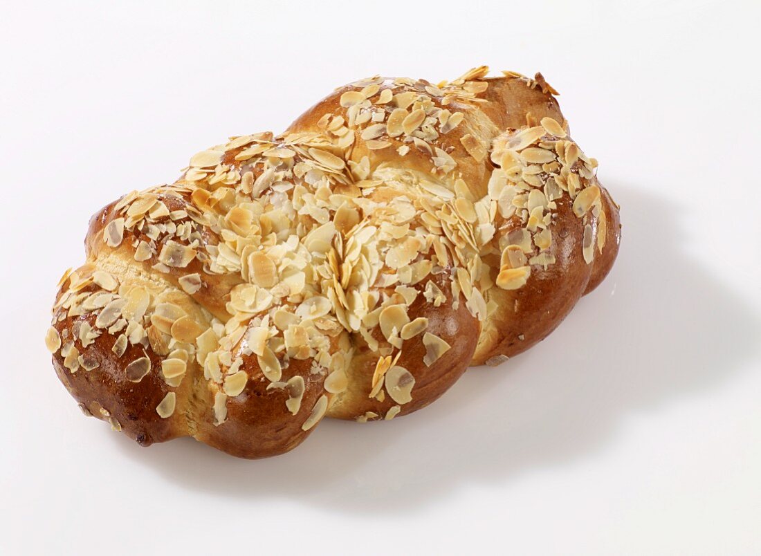 A bread plait with slivered almonds