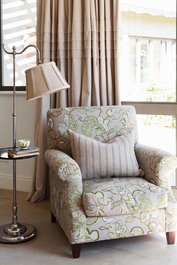 Armchair and vintage-style standard lamp