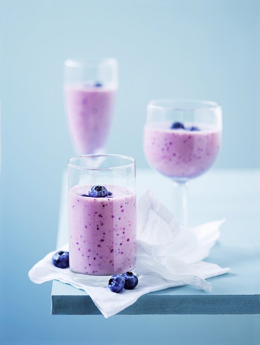 Glasses of blueberry yoghurt