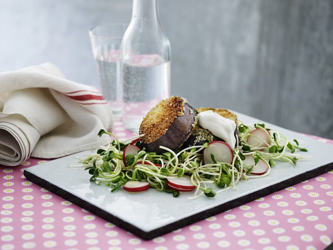 Aubergine escalope on a bed of salad