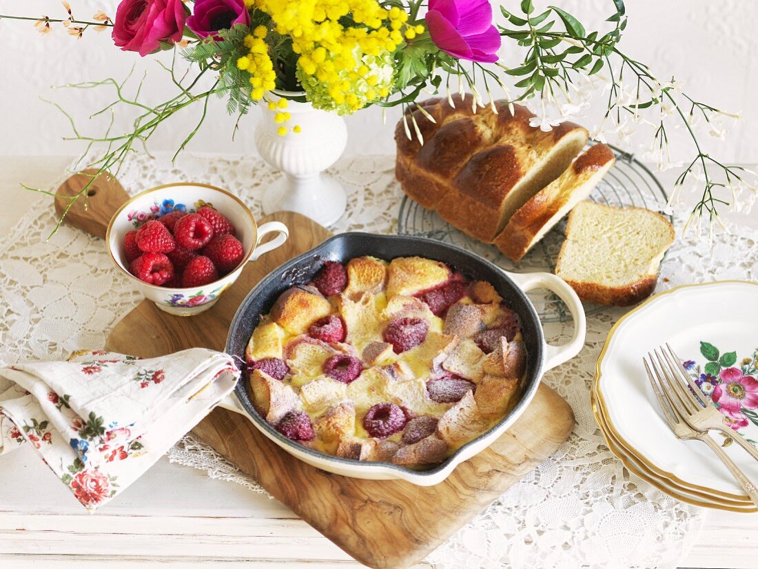 Bread pudding with raspberries in a pan