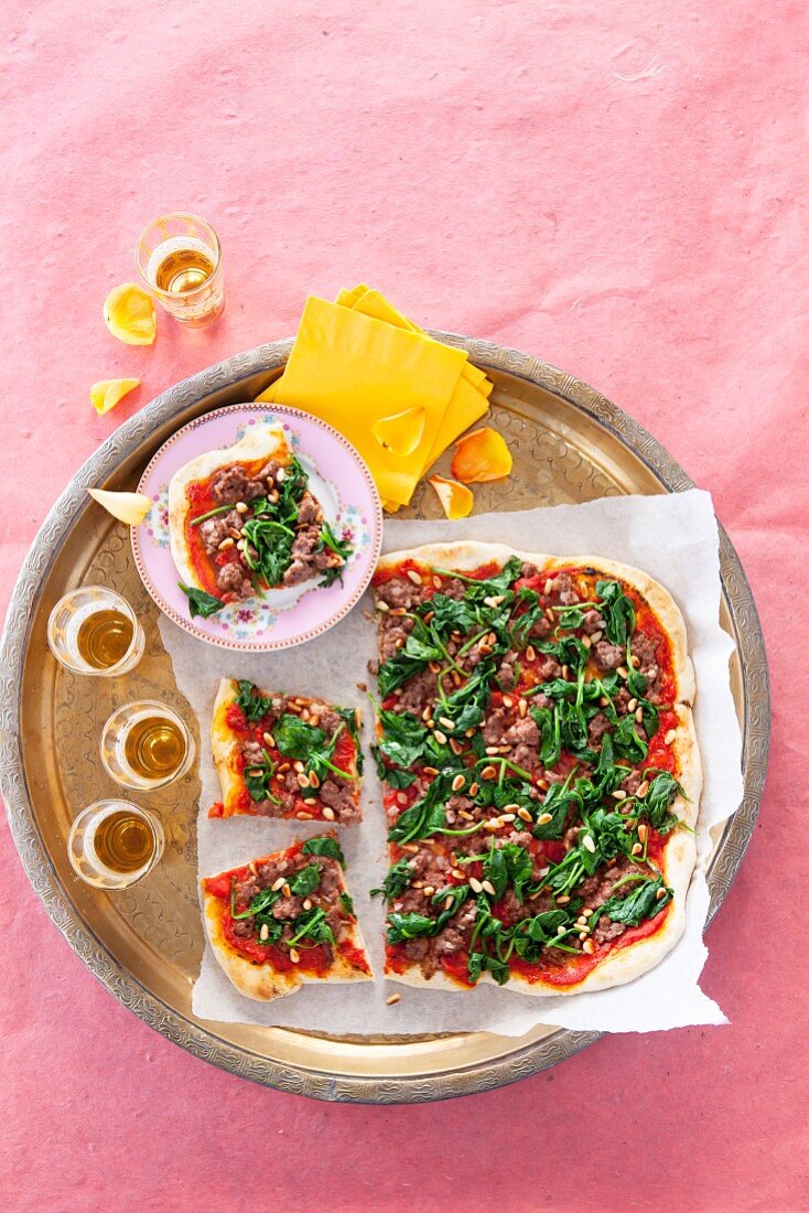 A minced meat, spinach and pine nut pizza (Lebanese)