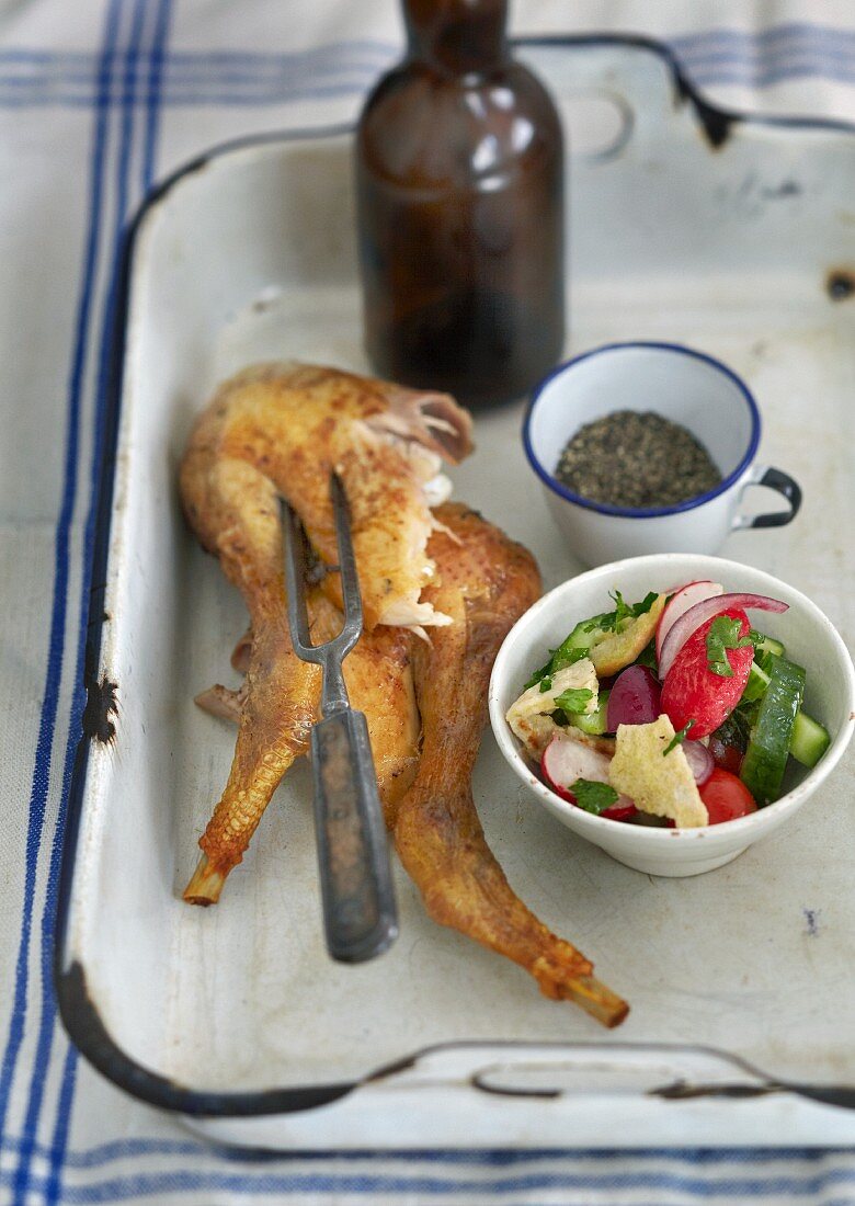 Roast chicken legs with salad