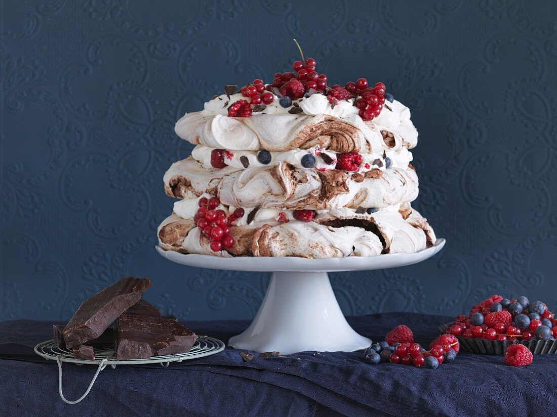 Chocolate pavlova with meringues and berries