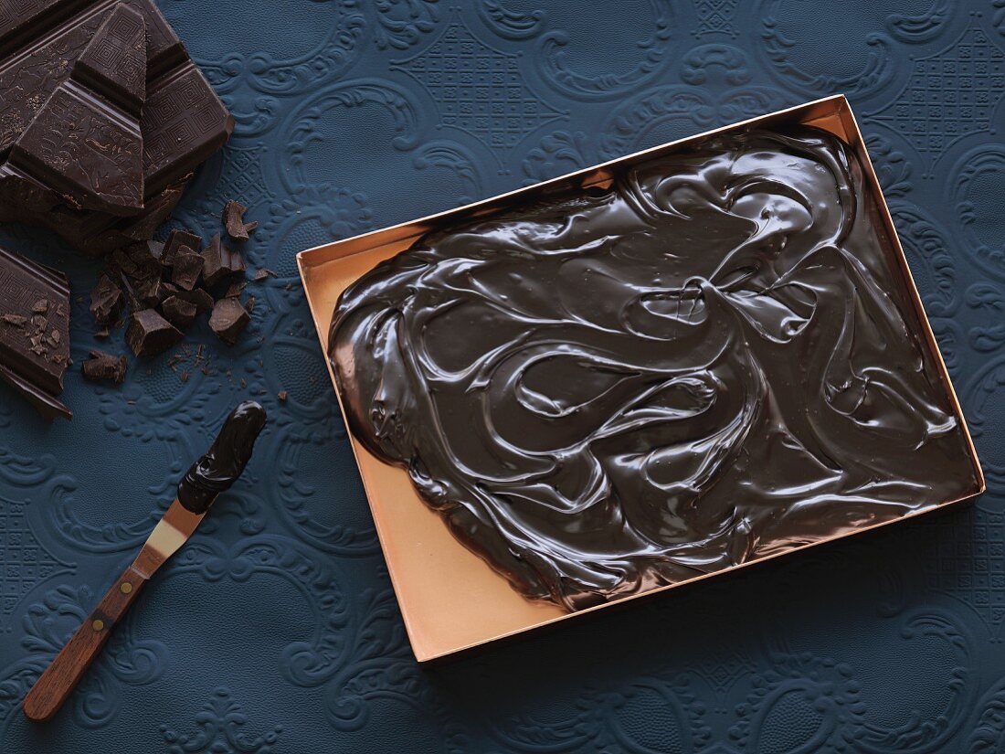 Melted grand cru chocolate on a baking tray