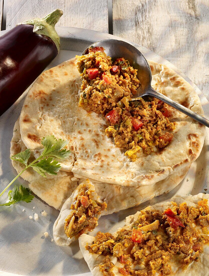 Baingan Bharta (aubergine curry, India) on unleavened bread