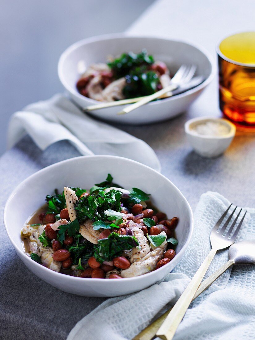 Braised chicken with bacon, beans and stem cabbage