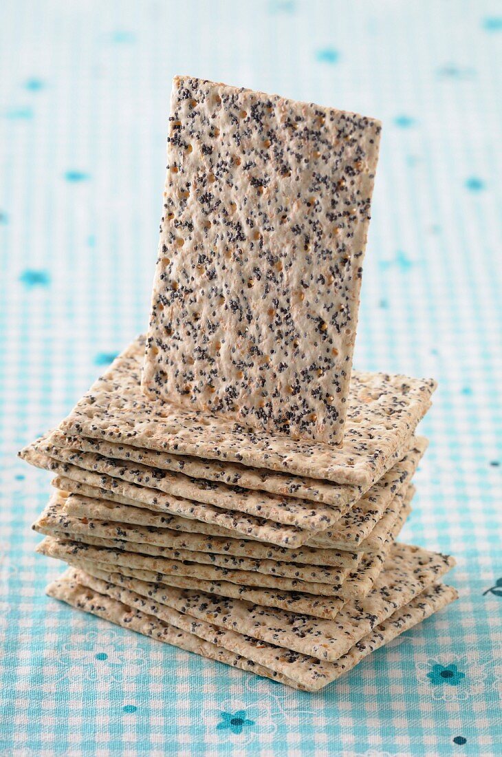 A stack of poppyseed crackers