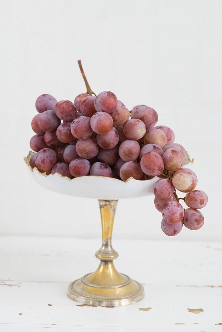Red grapes on a cake stand