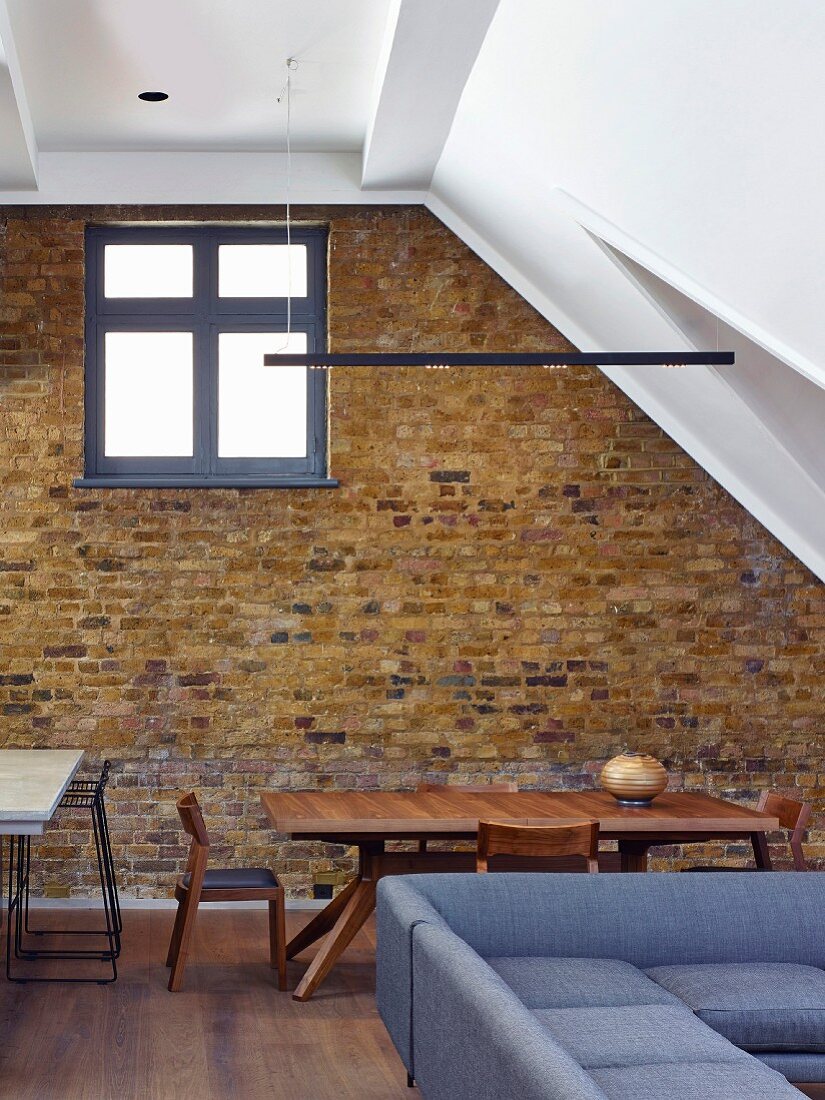 Exposed brick wall in living area