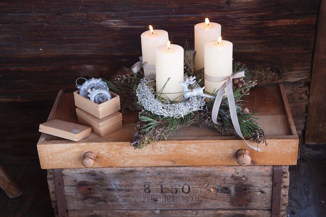 Star-shaped Advent wreath in rustic cabin
