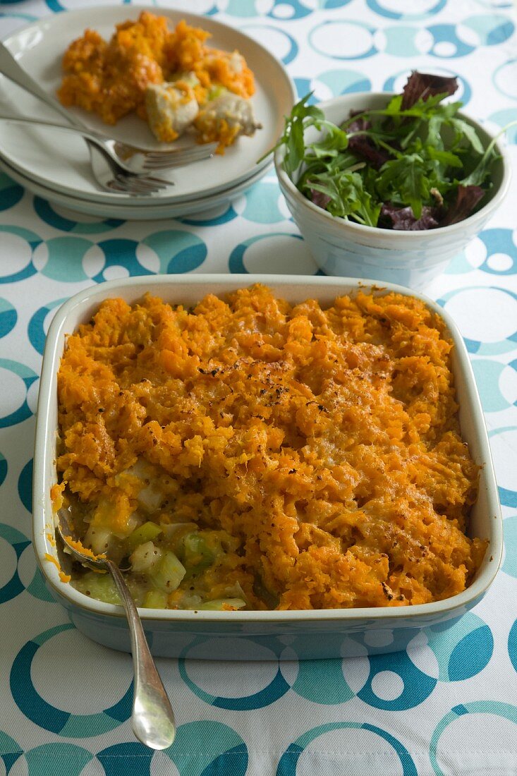 Chicken and leek pie topped with mashed sweet potatoes