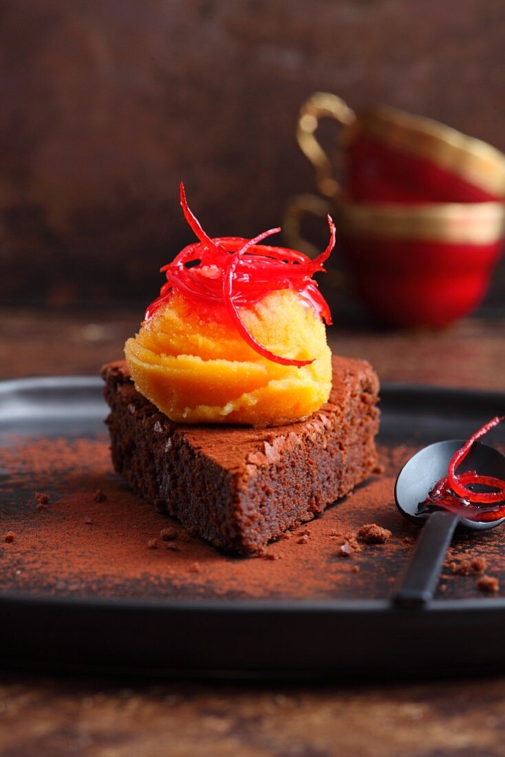 Blood orange and saffron sorbet on a slice of chocolate tart